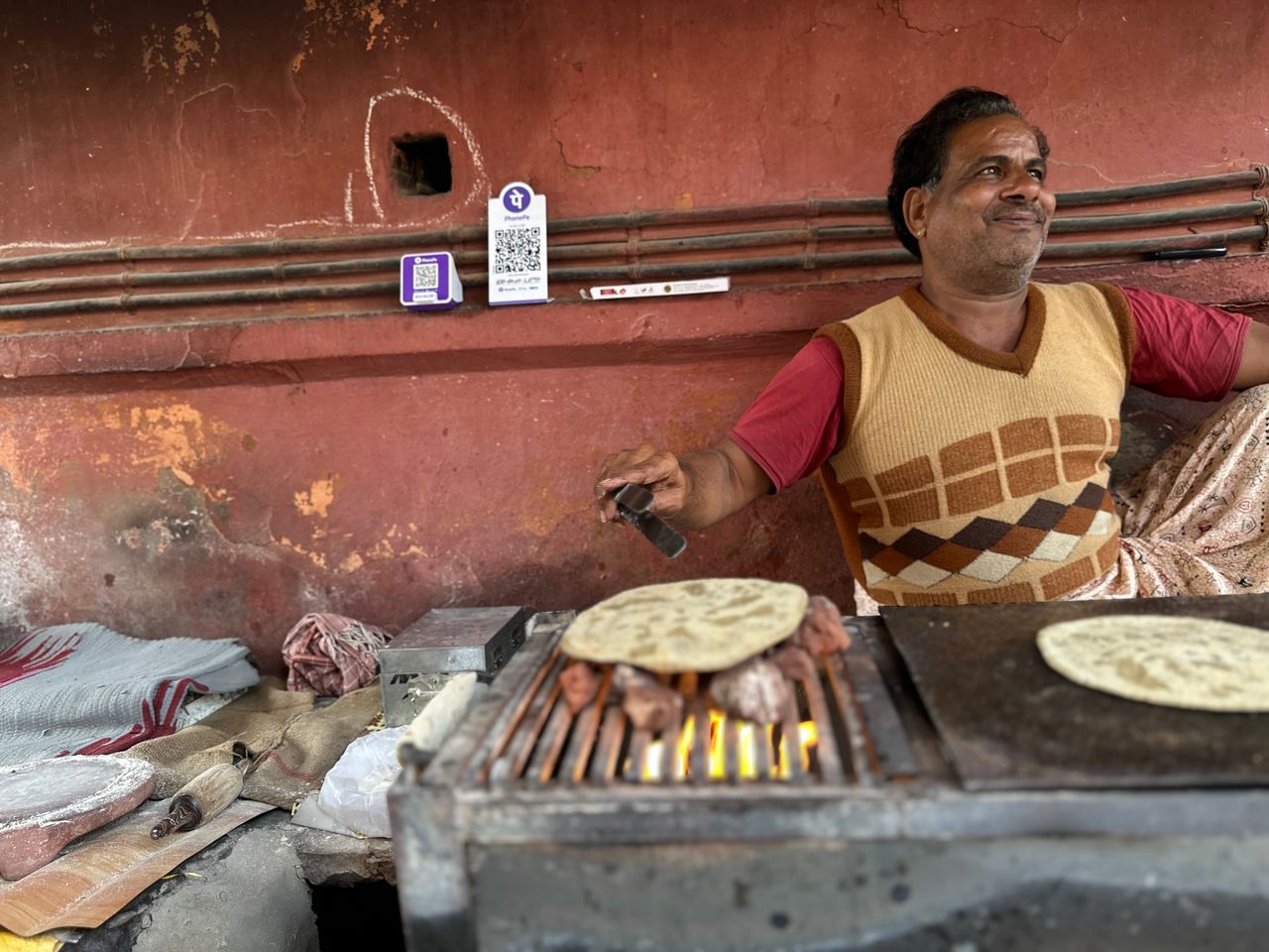 Naan baking in the tandoor